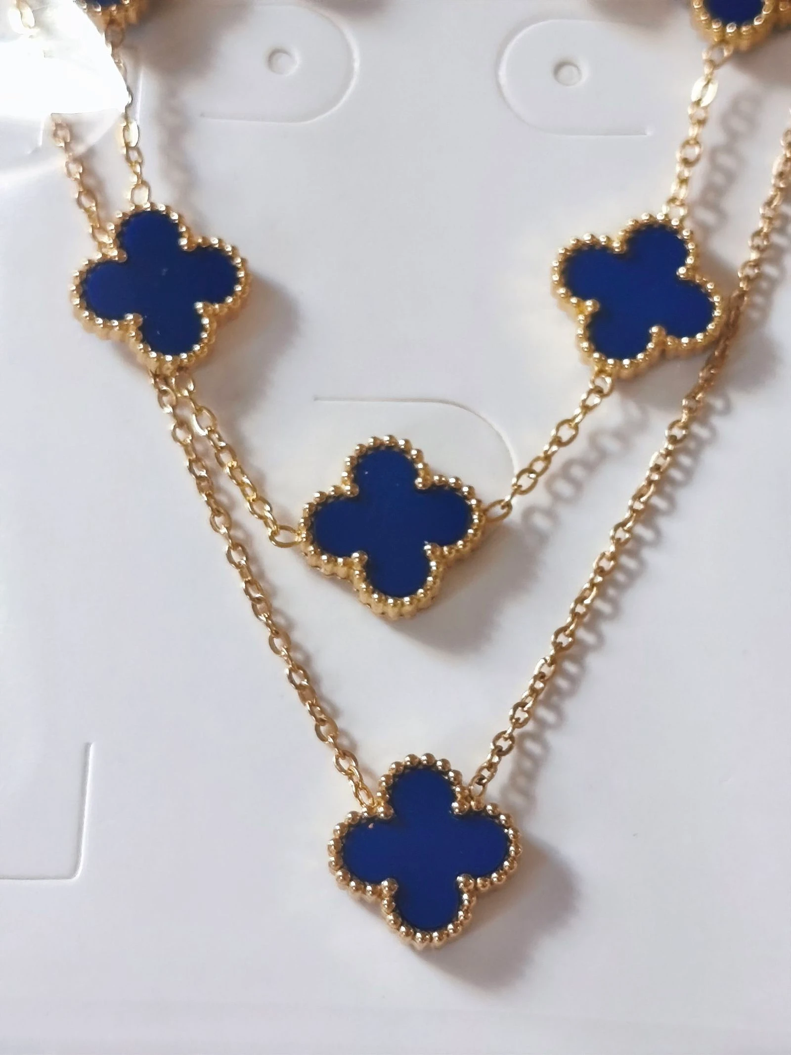Set de trebol azul con gargantilla pulsera y pendientes en cadena de acero